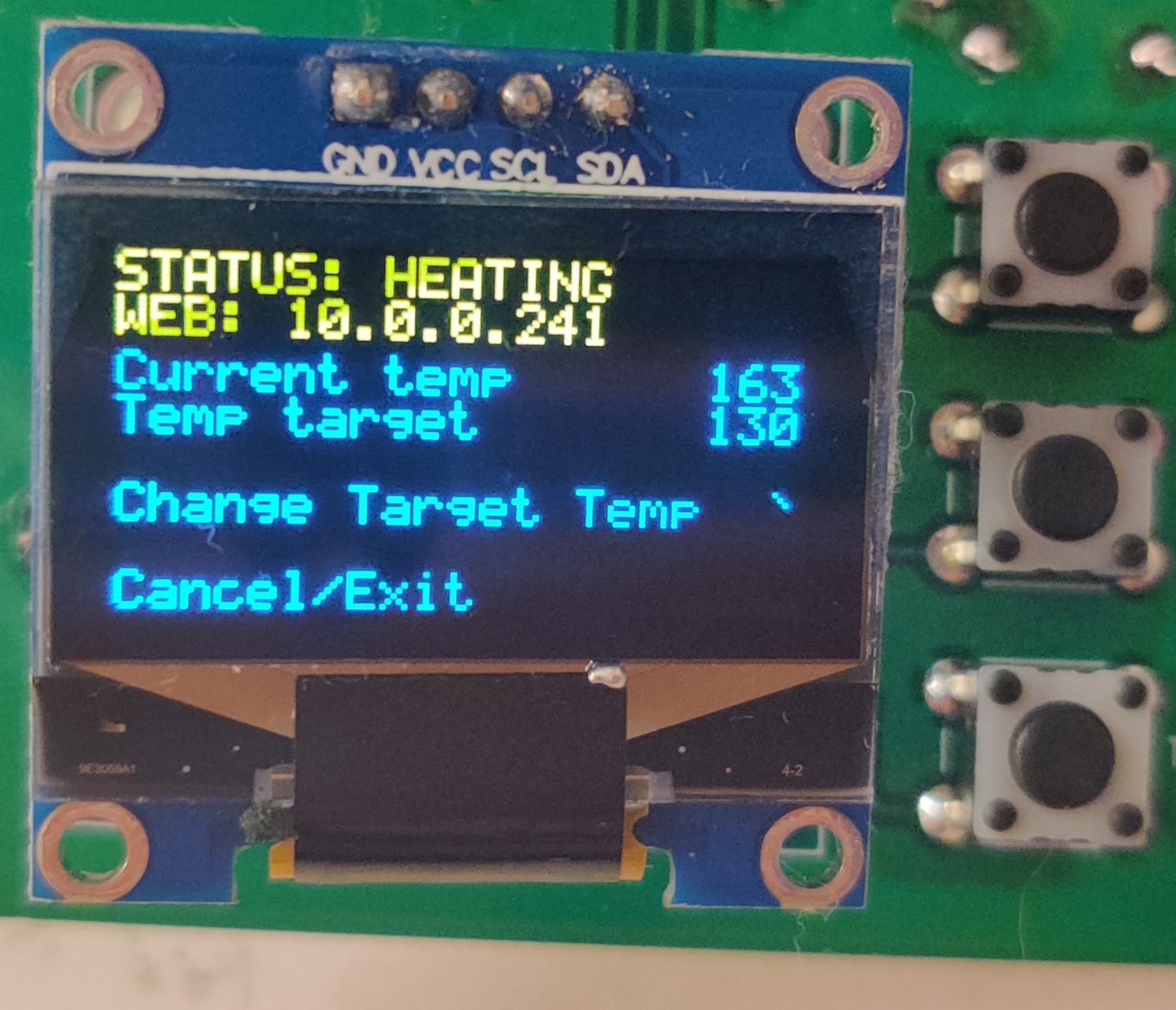 Photo of OLED interface with screen and buttons